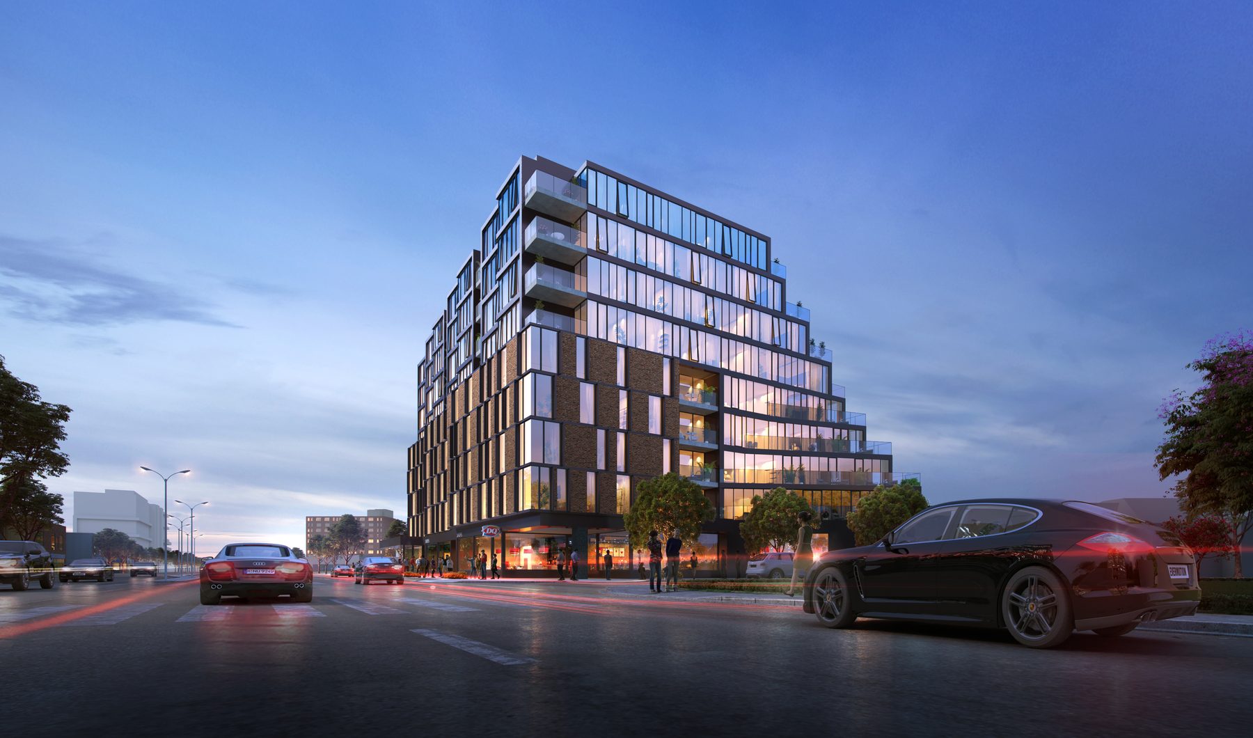 2880 Kingston Rd development, street-level dusk view